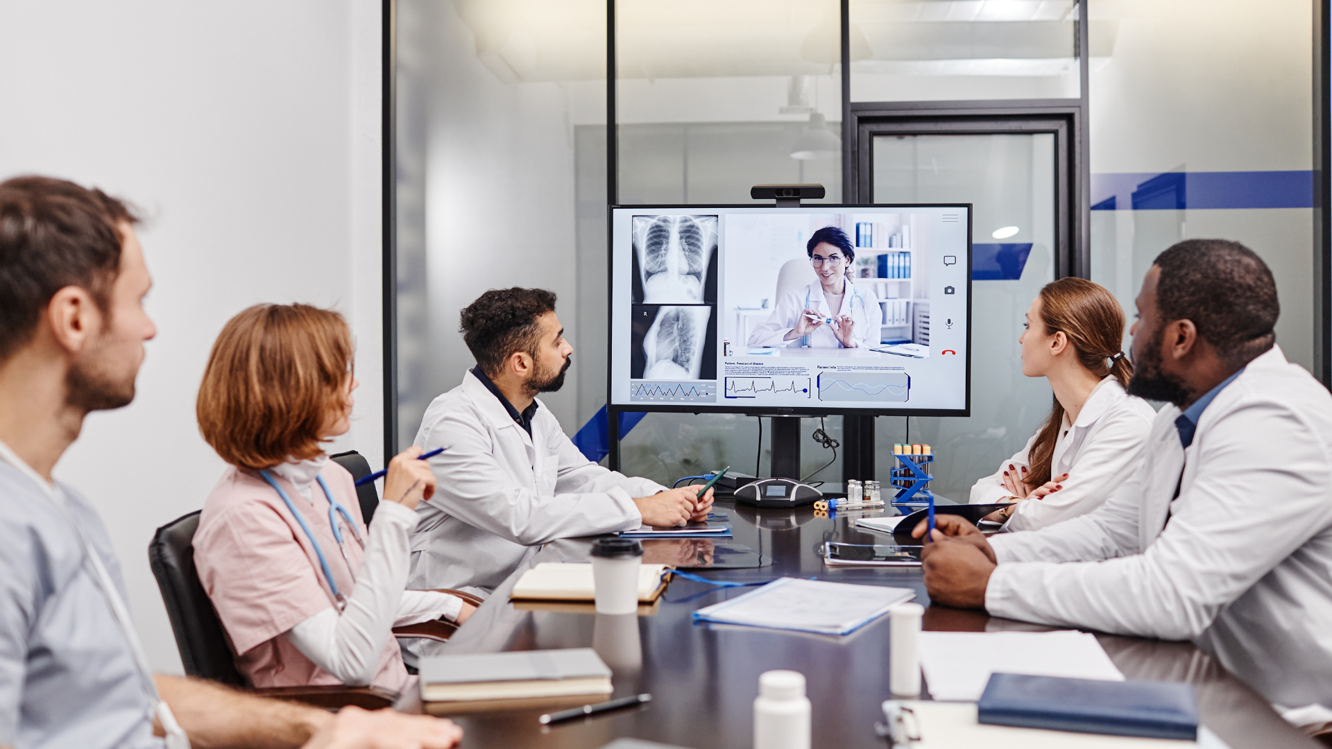 Doctors having a conference meeting on diagnosis using ClinicianCore Platform - Revolutionizing Healthcare Communication